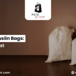 Wholesale Muslin Bags: Buyer Checklist Alt text: "Three white muslin bags of varying sizes against a brown background. Text reads 'Wholesale Muslin Bags: Buyer Checklist' with contact details and logo."